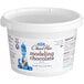 A white Satin Ice tub of blue modeling chocolate.
