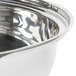 A close-up of a silver stainless steel water pan with a silver rim.