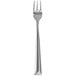 A close-up of a Walco stainless steel cocktail fork with a silver handle.