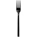 A black stainless steel Walco European table fork with a white background.