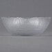 A clear Carlisle Petal Mist polycarbonate bowl.