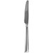 A Walco stainless steel European table knife with a silver handle and black blade.