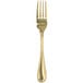 A Walco Colgate gold stainless steel dinner fork with a rectangular handle.