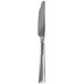 A Walco stainless steel dinner knife with a long handle.