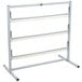 A metal Bulman paper rack with three shelves on it.