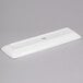 A CAC white rectangular porcelain platter with a handle.
