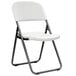 a white folding chair with black metal legs