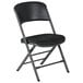 A black Lifetime folding chair with a black seat pad.