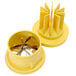 a yellow plastic object with sharp spikes