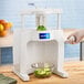 A Sunkist commercial sectionizer with limes in it.