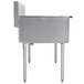 A large stainless steel Advance Tabco commercial sink with legs.