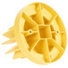 A yellow plastic Sunkist plunger with holes in it.