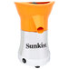 A Sunkist orange and silver citrus juicer with a white plastic container.