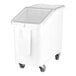 A white Cambro ingredient storage bin with wheels and a lid.