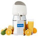 A Sunkist commercial citrus juicer with oranges and a glass of juice on it.