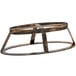 An antique brass metal oval stand.