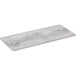 A white rectangular melamine display board with a faux white birch wood finish.