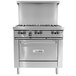 A stainless steel U.S. Range commercial gas range with a manual griddle over two ovens.