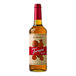 A close up of a Torani Puremade Hazelnut Flavoring Syrup label on a brown bottle.