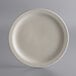 A white Libbey narrow rim stoneware plate on a gray background.