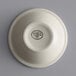 A close up of a white Libbey stoneware bowl with black text on the rim.