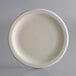 A white Libbey stoneware plate with a narrow rim.