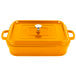 A yellow rectangular roasting pan with a lid.