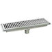 A metal Eagle Group floor trough with a stainless steel drain cover.
