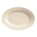 A cream white oval stoneware platter with a rolled edge.