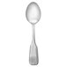 A Libbey stainless steel teaspoon with a design on the handle.
