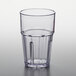 A clear plastic tumbler with a straw.