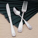 A Libbey stainless steel heavy weight tablespoon on a napkin.