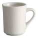 A plain white stoneware mug with a rolled edge and a handle.