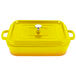 A yellow rectangular roasting pan with a lid.