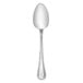 A Libbey stainless steel teaspoon with a white handle.