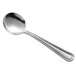A Libbey stainless steel bouillon spoon with a silver handle and spoon.