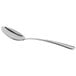 A close-up of a Libbey stainless steel dessert spoon with a silver handle.