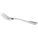 A close-up of a Libbey Wellington salad fork with a silver handle.