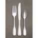 A close up of a Libbey stainless steel salad fork.