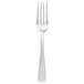 A Libbey stainless steel dinner fork with a silver handle.