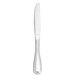 A silver Libbey Brandware dinner knife with a white handle.