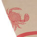 A brown paper table cover with a white drawing of a crab.