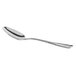 A Libbey stainless steel dessert spoon with a silver handle and spoon.