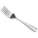 A Libbey Windsor Grandeur dessert fork with a silver handle.