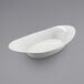 a white oval shaped bowl