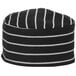 A black and white striped Mercer Culinary baker's skull cap on a counter.