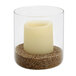 A Sterno Allure candle burning in a glass container.