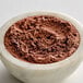 a bowl of brown powder