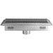 A Regency stainless steel floor trough with metal grate.