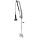 A T&S DuraPull pre-rinse faucet with a hose and wall bracket.